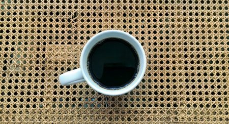 Minimalist Overhead View Coffee Mug Woven Tabletop Peaceful Morning Ritualの写真素材