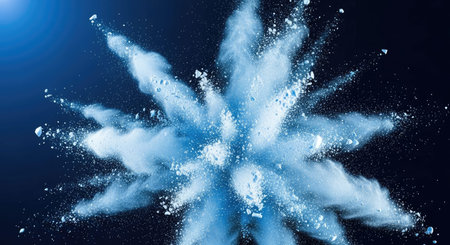 A striking blue powder explosion fills the frame, creating a dramatic visual effect with swirling...