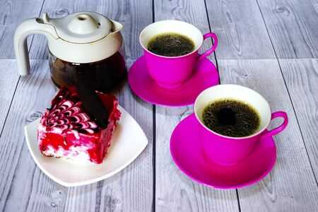 Eastern Turkish sweets baklava and cup of coffee on wooden tableの写真素材