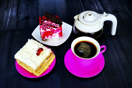 Eastern Turkish sweets baklava and cup of coffee on wooden tableの写真素材