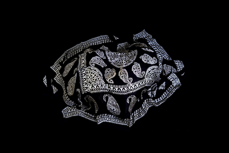 colorful Turkish Oriental beautiful scarves with pictures of natural silk on a black background