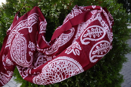colorful Turkish Oriental beautiful scarves with pictures of natural silk on a white backgroundの写真素材