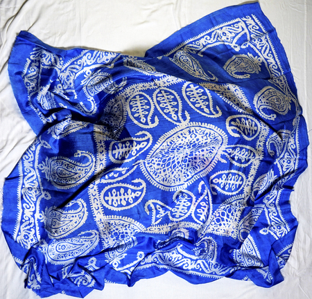 colorful Turkish Oriental beautiful scarves with pictures of natural silk on a white backgroundの写真素材
