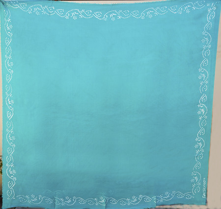 colorful Turkish Oriental beautiful scarves with pictures of natural silk on a white backgroundの写真素材
