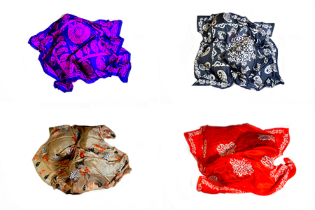 colorful Turkish Oriental beautiful scarves with pictures of natural silk on a white backgroundの写真素材