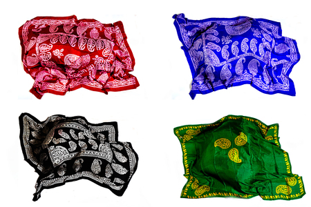 colorful Turkish Oriental beautiful scarves with pictures of natural silk on a white backgroundの写真素材