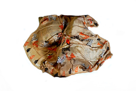 colorful Turkish Oriental beautiful scarves with pictures of natural silk on a white backgroundの写真素材
