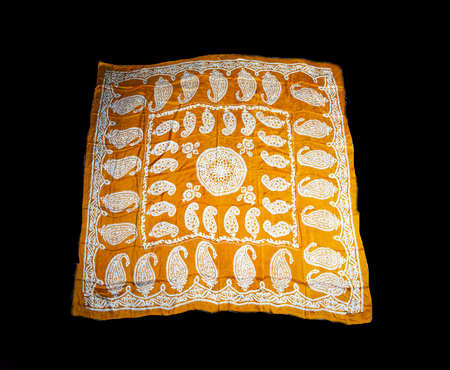 colorful Turkish Oriental beautiful scarves with pictures of natural silk on a black backgroundの写真素材