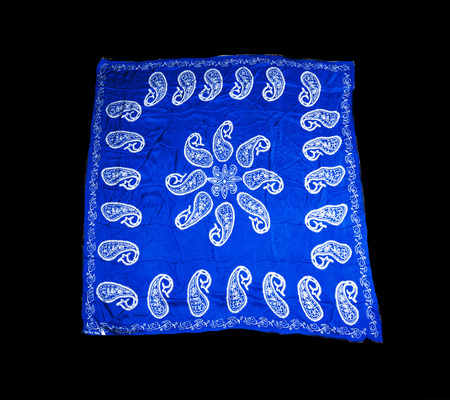 colorful Turkish Oriental beautiful scarves with pictures of natural silk on a black backgroundの写真素材