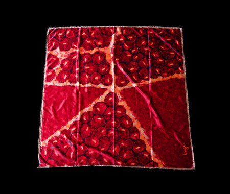colorful Turkish Oriental beautiful scarves with pictures of natural silk on a black backgroundの写真素材