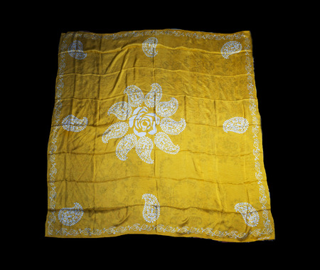 colorful Turkish Oriental beautiful scarves with pictures of natural silk on a black backgroundの写真素材
