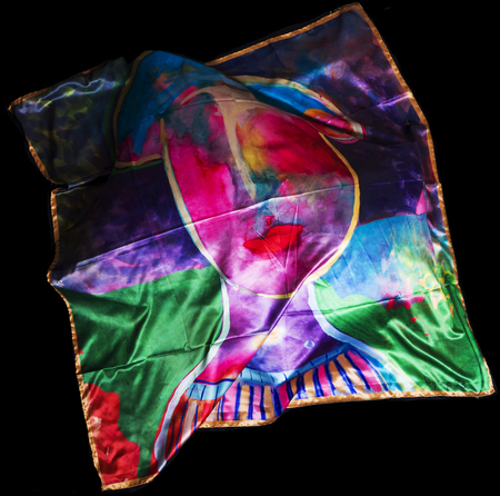 colorful Turkish Oriental beautiful scarves with pictures of natural silk on a black backgroundの写真素材