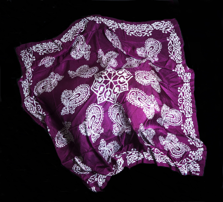 colorful Turkish Oriental beautiful scarves with pictures of natural silk on a black backgroundの写真素材