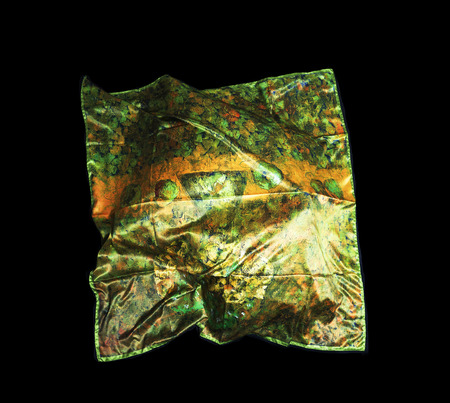 colorful Turkish Oriental beautiful scarves with pictures of natural silk on a black backgroundの写真素材