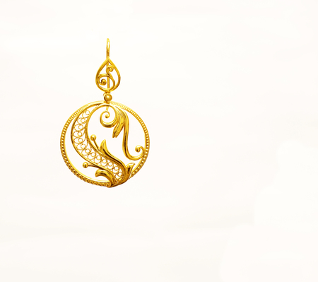 female Golden Eastern Turkish vintage womens handmade jewelry on a white background.earrings,の写真素材