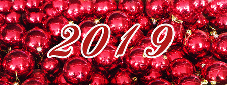 2019 christmas and happy new year concepts with red ball ornament, backgroundの写真素材