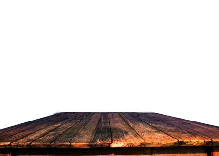 Real nature dark brown wood table top texture on white background.For create product display or...