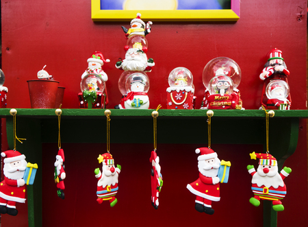 Christmas or New Year holiday background, texture, wallpaper. Flat-lay of colorful green, red and...