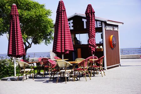BAKU, AZERBAIJAN, 16 MAY 2018 : Street eastern turkish cafe with pattern tablecloth and wooden chairsのeditorial素材