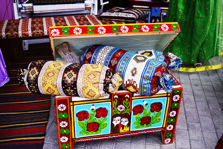 Treasure chest. Ancient Wooden treasure chest locked on wooden surface background. Old wood chest closed isolated on wooden background. Old wooden chest with closed lit. pandoras box.Decorative chestsの写真素材