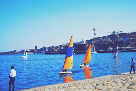 Luxury yachts at Sailing regatta. Sailing in the wind through the waves at the Sea.の写真素材