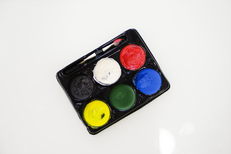 Simple watercolor paints palette isolated on white background, top viewの写真素材