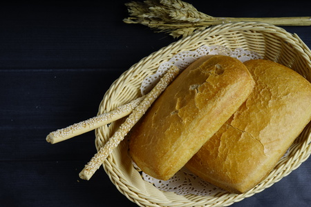 The concept of Turkish cuisine. Turkish white bread is prepared for sale, which is laid out in an...