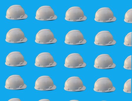 Plastic hard white safety construction helmet on white backgroundの写真素材