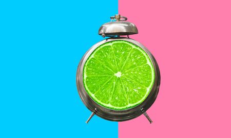 Summer time concepts idea with alarm clock on colorful background.holiday decoration imagesの写真素材