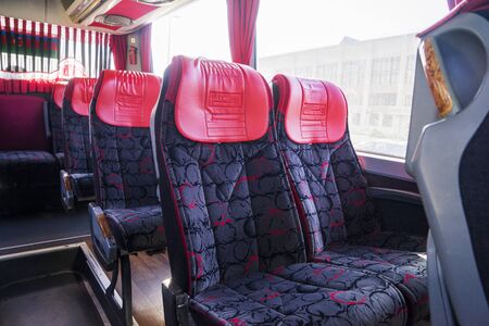 Row of seats inside tourist bus, shot in exhibition.の写真素材
