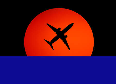 black silhouette of the plane against the orange sun in the dark skyの写真素材