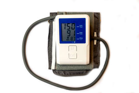 Automatic digital blood pressure monitoring meter on white backgroundの写真素材