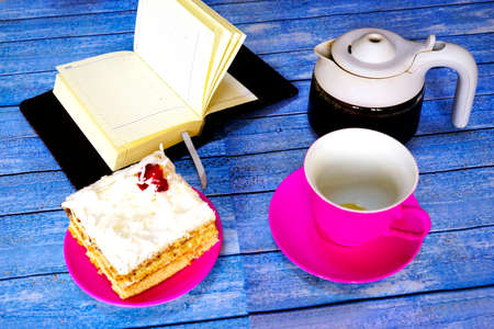 Oriental, Turkish, Azerbaijani baklava sweets in a white plate on the wooden table.の写真素材