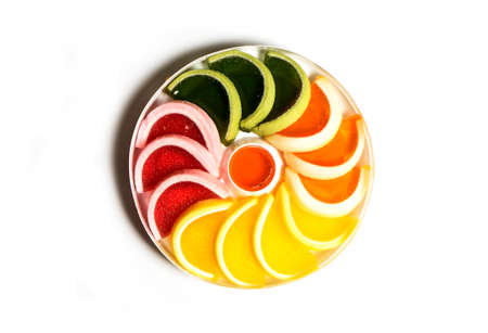 Multi-colored sweets, marmalade and sweets isolated on a white background. copy space.