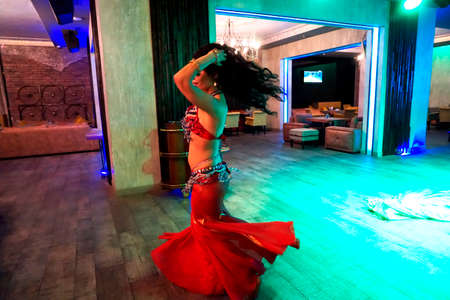 BAKU, Azerbaijan-JUNE 26, 2018: an Arab dance Dancer dances on stage in a restaurantのeditorial素材
