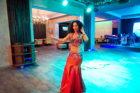 BAKU, Azerbaijan-JUNE 26, 2018: an Arab dance Dancer dances on stage in a restaurantのeditorial素材