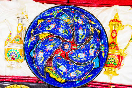 blue Turkish Oriental decorative ceramic plates, kitchen dishes on shelves