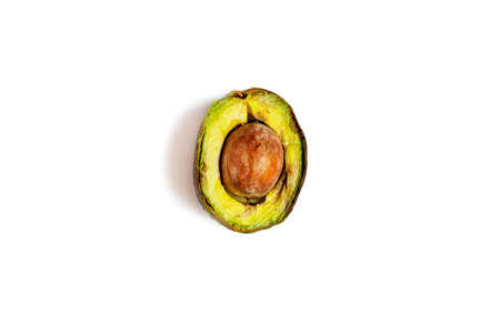 over-ripe, spoiled avocado on a white backgroundの写真素材
