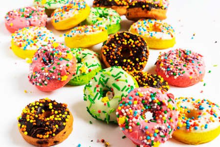 Set of various colorful donuts isolated on white background. Top viewの写真素材
