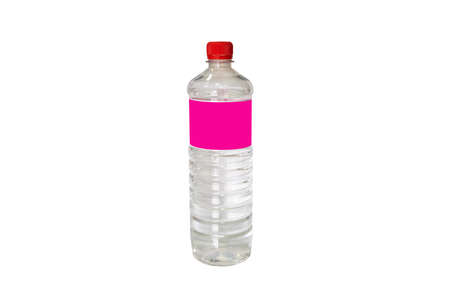 plastic bottles with pure spring water on isolated background.with red plastic coverの写真素材