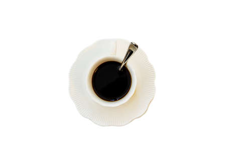 Cup of black hot espresso coffee with steam on white background. Top view, copy space. Morning espresso on table.の写真素材
