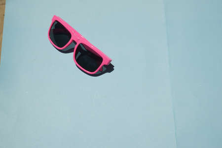 Pink sunglasses pattern on pastel background. Minimal summer concept. Isometric print.