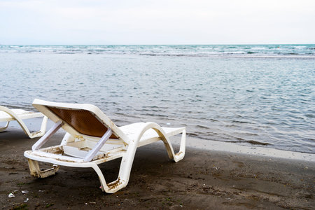 the white canvas beach bed on the beach.の写真素材