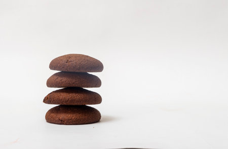 oatmeal cookies with chocolate on a white backgroundの写真素材