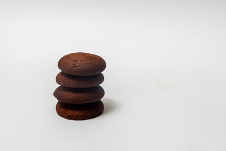 oatmeal cookies with chocolate on a white backgroundの写真素材