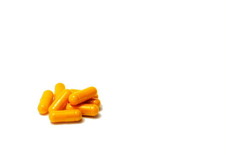 Various pills isolated over the white background. Selective focus. Health and medical treatment...