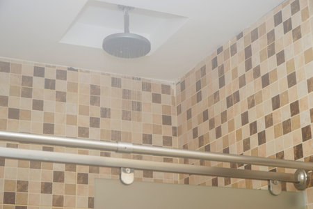 Detail of modern ceiling shower in the bathroomの写真素材