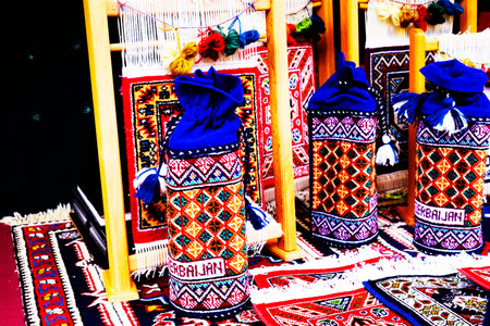 Many turkish rugs folded and stacked in the shop. Close up shot of piled carpets.の写真素材