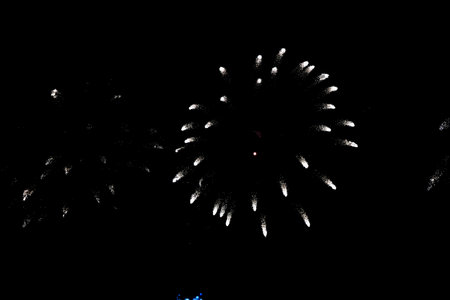 Colorful fireworks over dark sky, displayed during a celebrationの写真素材
