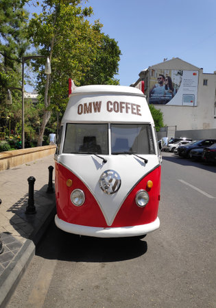 BAKU, AZERBAIJAN - JULY 11, 2023 : Street coffee shop of old retro minibus. car is equipped for sale of coffee and drinksのeditorial素材